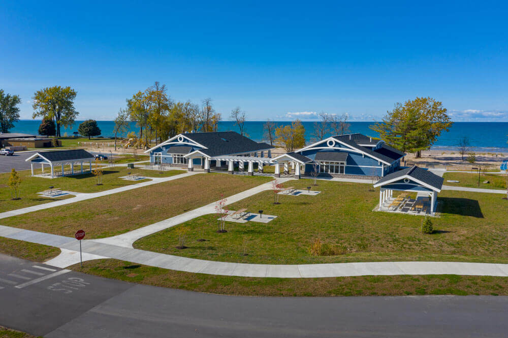 aerial view of beach park complex with ocean in the background