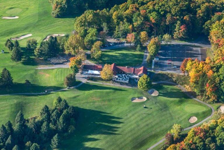 aerial view of golf clubhouse and course