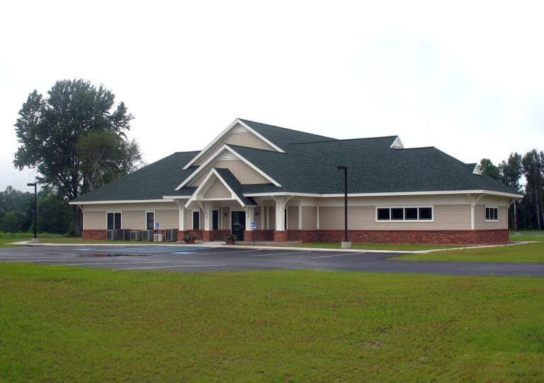 architect designed municipal building with tiered roof design