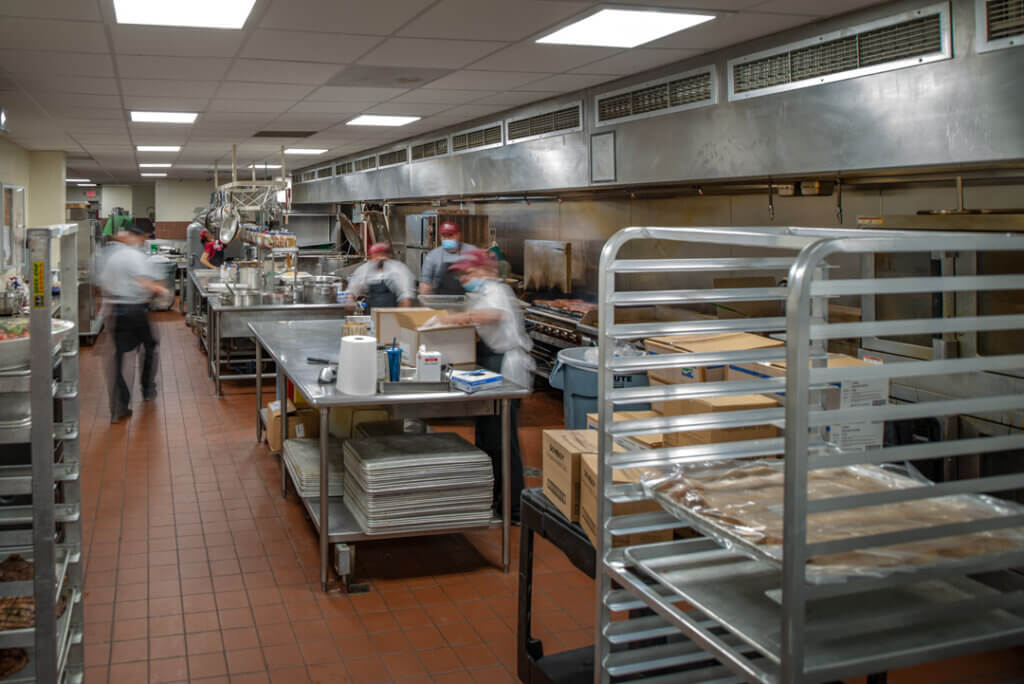 Chefs prepare food in the newly renovated kitchen in Frank Dining Hall