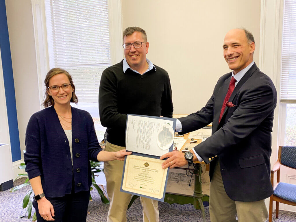 Assemblyman John Lemondes presenting Joseph Kime, P.E., President, and Julia Furlong, Marketing Manager, with a certificate recognizing Beardsley in the Historic Business Preservation Registry.